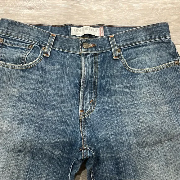 Levi’s Distressed Low Boot Cut Blue Jeans 33 Waist - Picture 9 of 12